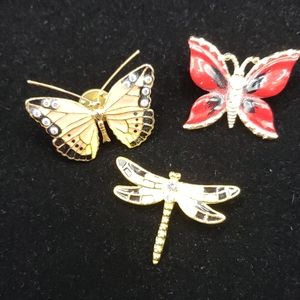 3 brooches 2 butterfly and one dragonfly